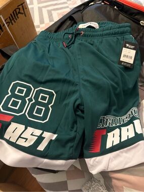 Copper Rivet Men's Teal Athletic Basketball Shorts with Graphic Numbers